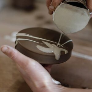 Slip decorating earthenware tin can trailing Patia Davis