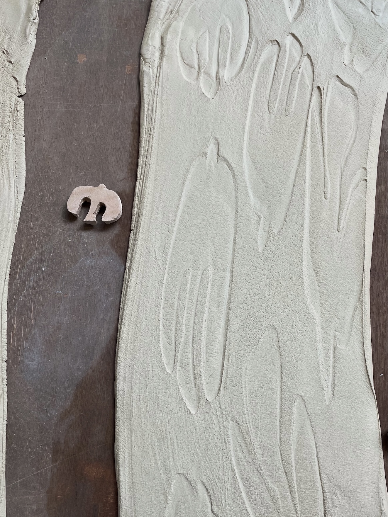 Impressed and Stretched bird motif on porcelain slab by Isabelle Proffitt